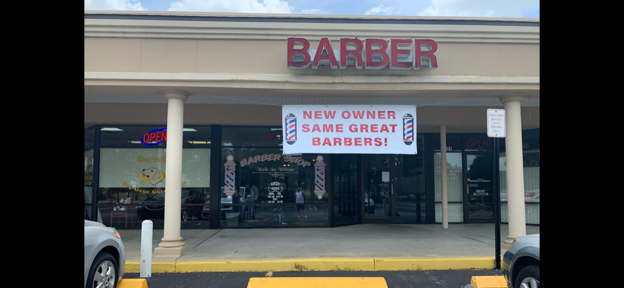 Friendship Barbers, at the entrance to On Top Of The World Community