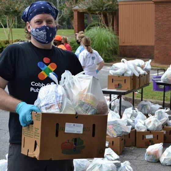 Drivethrough food pantries continue to help families in need (Cobb