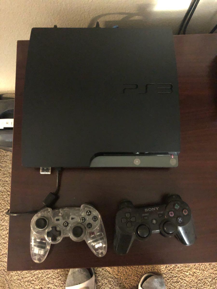playstation 3 with 2 controllers